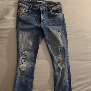Light-medium wash paint splattered jean